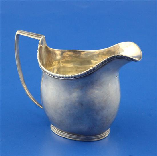 A George III silver helmet shaped cream jug by Joseph Biggs, 3.5 oz.